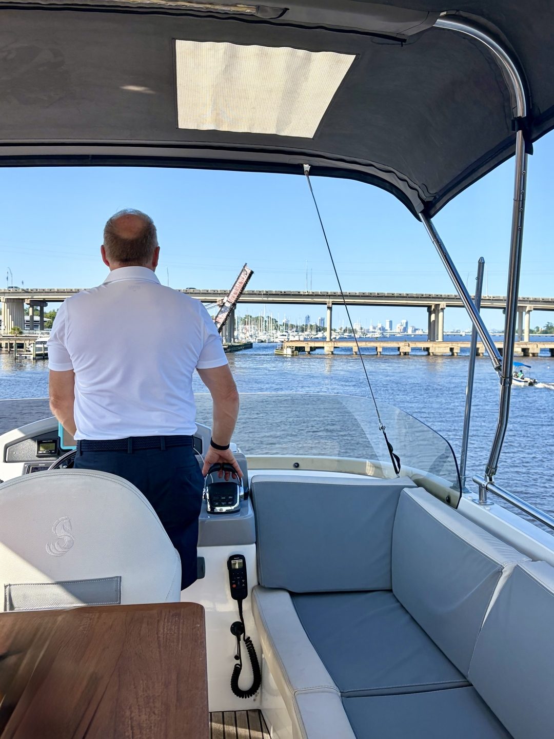 Captain at the helm with a panoramic bridge view