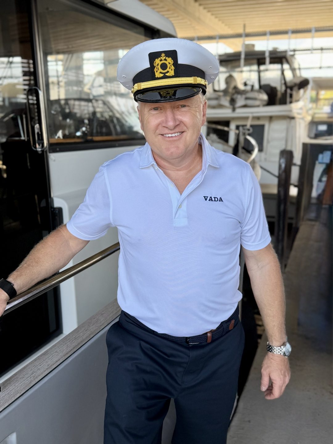 Captain Vance Stallings in captain's hat aboard VADA