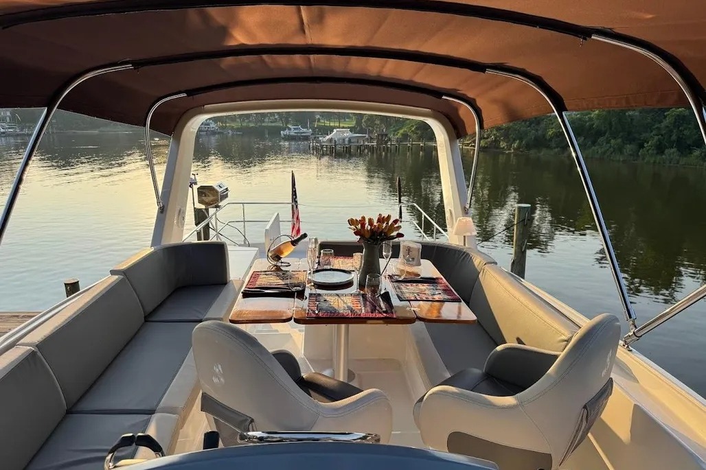 Aft deck dining setup aboard VADA